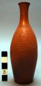 Bottle, ceramic, red ware, incised designs, constricted neck, flaring rim