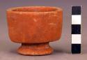 Miniature pottery cup with annular base