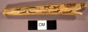 Fragment of ivory pipestem, incised with hunting scenes