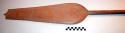 Paddle, incised human, animal and geometric designs on blade, cracked