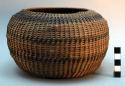 Paiute basket. Rod coiled jar. Non interlocking stitches. 3 bands of dark stitch