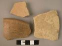Ceramic rim and body sherds, 1 brown burnished ware, 2 undecorated ware