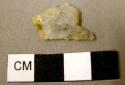 Fragment of base notched stone arrowpoint