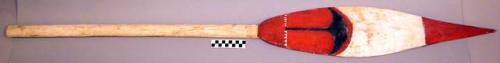 Wooden paddle - blade is carved and decorated with design in black, +