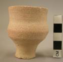 Pottery footed? cup - plain ware, light