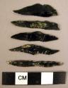 14 obsidian backed blades of the Chatelperron type
