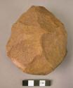 Broad, oval, pebble-butted quartzite hand axe