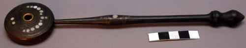 Black wood cigarette holder with brass and mother of pearl inlay and +