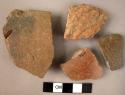 Ceramic rim and body sherds, brown and red burnished ware, 1 cord impressed