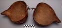 Gourd bowls, attached by leather thong, diameter each 9 in.