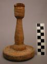 Candle stick, carved wood, circular lipped base, tapered stem, rounded holder