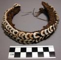 Fiber bag trimmed with shells - used in dances, worn around neck. +