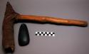 Adze (yara) - wooden handle with black stone blade, raffia wrapped around base o