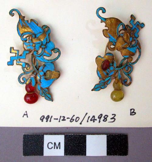 Pair of Gilt Ornaments with Feathers, Beads, and Swastika ("WAN")