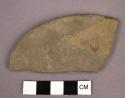 Groundstone disc, fragment