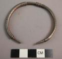 Metal armlet - covered with fine wire coils