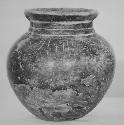 Fine-incised black jar (A); Incised black "Cuspidor", tripod