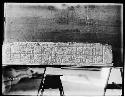 Hieroglyphic inscription on front edge of lintel from ruined building