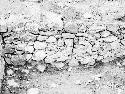 Structure 1, east wall of cellar hole, includes trench 1