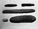 Stone pestles from rooms 52, 59, and 37
