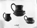 3 black ware vessels - 2 handled cups