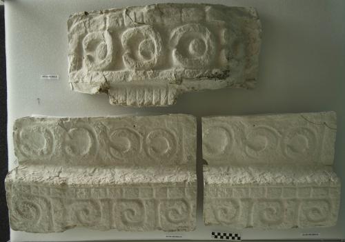 Cast of architectural piece, Structure 1, East wing, corner mask, eyelid