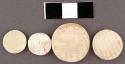 Cardium shell disks. smallest: 1.4 dia., .5 cm. th. and largest: 2.4 cm. dia.,