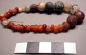 String of beads, carnelian, quartz