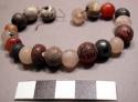 String of beads, carnelian, quartz