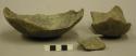 Ceramic base of partial vessel, body fragment repaired and sherds