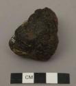 Lump of black pitch with cord impression