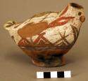 Polychrome pottery bird-form jar - red, white, black