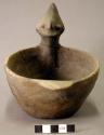 Ceramic effigy vessel, bowl, mended around effigy head