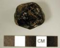 Pebble, nodule, small, irregular, spherical, multifaceted; obsidian