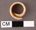 Ring, made of conus shell - 1.3 x .6 cm.