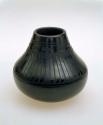 Black-on-black shouldered vase:  feather motif