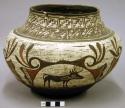 Polychrome pottery vessel - black, red and white; animal and geometric design de