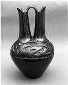 Black carved wedding vase; geometric motif