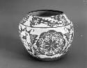 Polychrome-on-white Olla; floral and animal motif