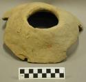 Ceramic partial vessel, two openings, faint red slip