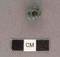 Jadeite bead-like object, broken 13mm. max diam. x 8mm.