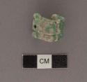 One broken green and white blotched jade nose ornament. 18x16x14. Three fragment