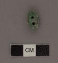 Small jade bead with cross perforations