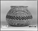 Jar-shaped basket, from a collection through G. Nicholson. Coiled, three-rod foundation, non-interlocking stitches.