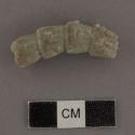 One scorpion or snake tail fragment of pale green  carved jade - decomposed - 7