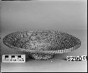 Basket, coiled bowl-shape, two open-work bands, pedestal base