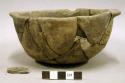 Ceramic complete vessel, two handles, heavily mended, one sherd inside