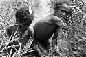 Samuel Putnam negatives, New Guinea; edge fog; NG; children playing in a ditch