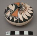Polychrome flat seed pot; signed Marcella Augustine / Acoma, N.M