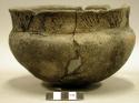 Ceramic complete vessel, incised rim, heavily mended
